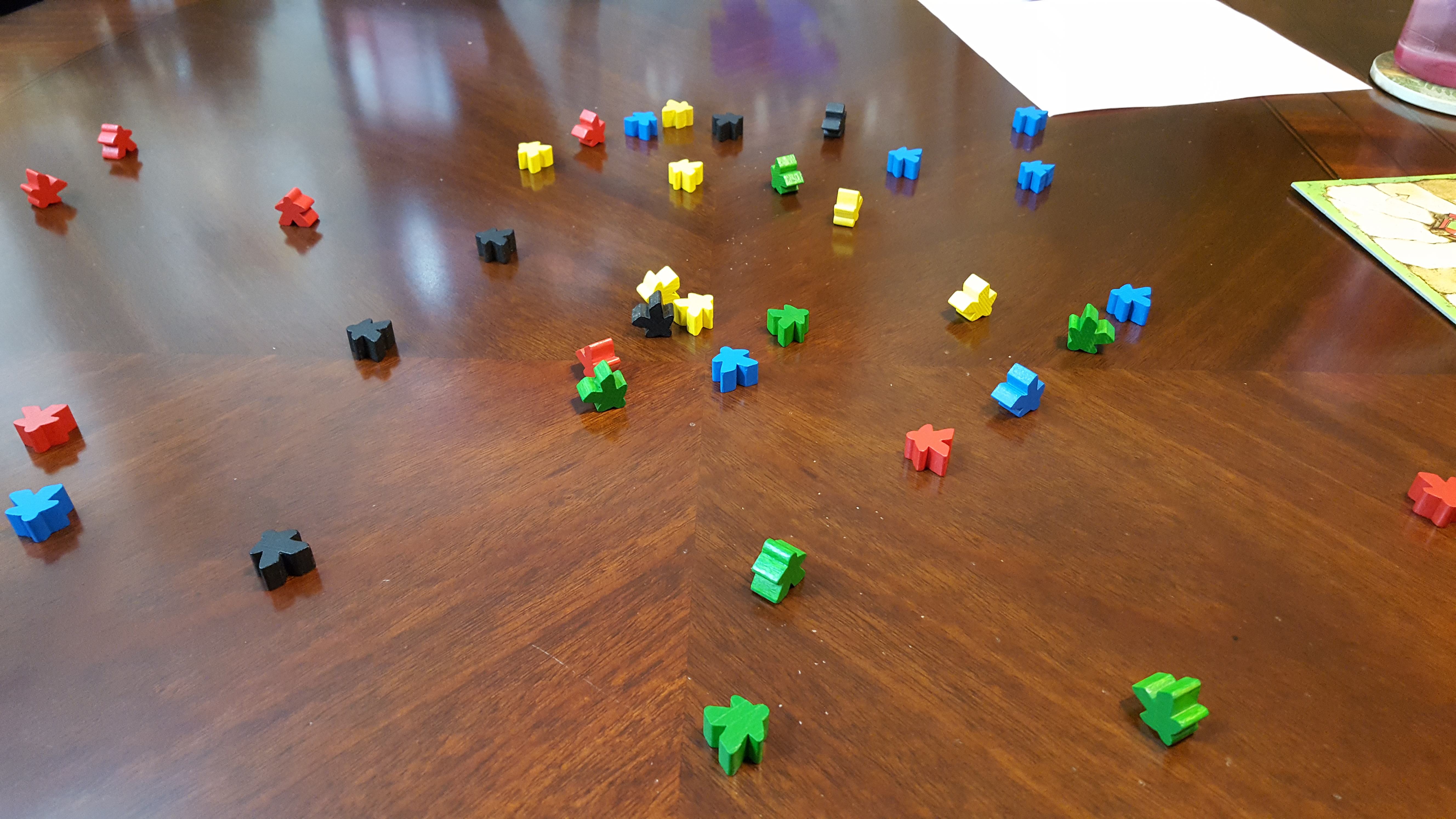 Carcassonne pieces rolled